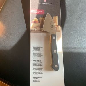 New in package Victorinox Parmesan cheese knife!